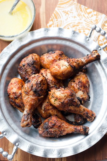 This grilled Moroccan chicken has the best and EASIEST marinade! Don't forget to make the garlic sauce. It totally makes this meal spectacular! | grilled chicken recipes | perrysplate.com