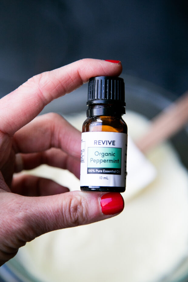 A bottle of organic peppermint essential oil from Revive.