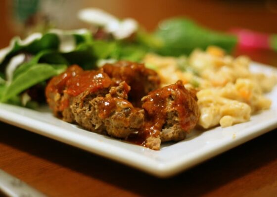 These petite little meatloaves are a quick alternative to a long-baking full-sized meatloaf. They're finished in a fraction of the time and are bathed in a tangy BBQ-like pan sauce.