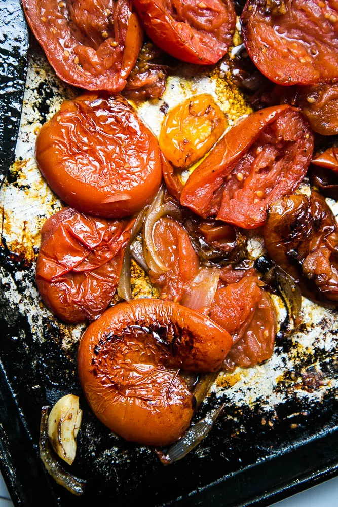 This easy Balsamic Roasted Tomato Sauce is totally delicious and versatile! Use it in any recipe that calls for marinara or on pizza. | perrysplate.com #tomatorecipes #tomatosauce