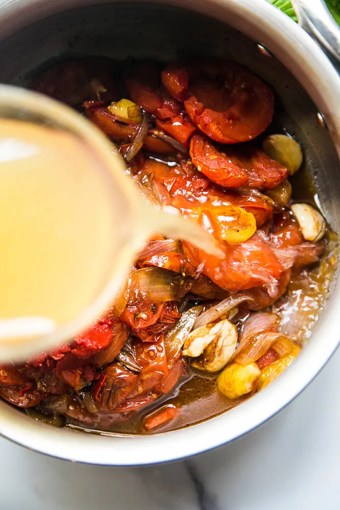 This easy Balsamic Roasted Tomato Sauce is totally delicious and versatile! Use it in any recipe that calls for marinara or on pizza. | perrysplate.com #tomatorecipes #tomatosauce This easy Balsamic Roasted Tomato Sauce is totally delicious and versatile! Use it in any recipe that calls for marinara or on pizza. | perrysplate.com #tomatorecipes #tomatosauce