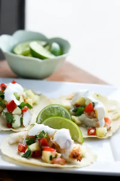 Tropical Fish Tacos with Pineapple Salsa 2 Tropical Fish Tacos with Pineapple Salsa | fish taco recipes | gluten-free recipes | tex-mex recipes | pineapple recipes | perrysplate.com