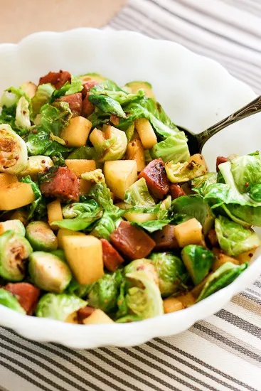 Brussels Sprout & Sausage Hash with Apples is EASY to make -- even with a baby on your hip.