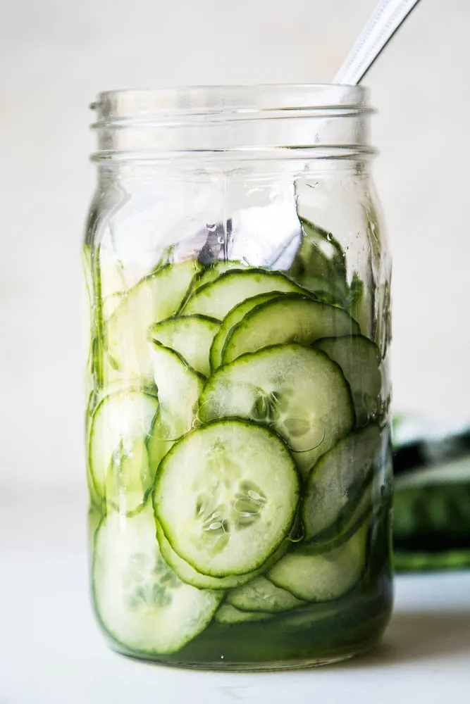 Simple Marinated Cucumbers aka Cucumbers & Vinegar is a crazy easy and fast side dish that goes with most everything! Plus they last a long time in the fridge for snacking. | perrysplate.com #cucumbersandvinegar #quickpickle Simple Marinated Cucumbers aka Cucumbers & Vinegar is a crazy easy and fast side dish that goes with most everything! Plus they last a long time in the fridge for snacking. | perrysplate.com #cucumbersandvinegar #quickpickle