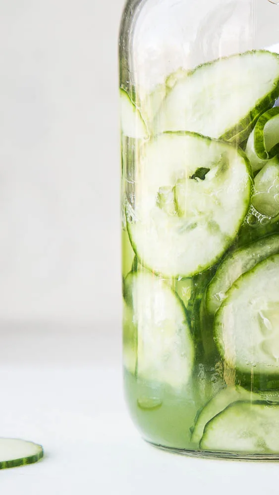 Simple Marinated Cucumbers aka Cucumbers & Vinegar is a crazy easy and fast side dish that goes with most everything! Plus they last a long time in the fridge for snacking. | perrysplate.com #cucumbersandvinegar #quickpickle