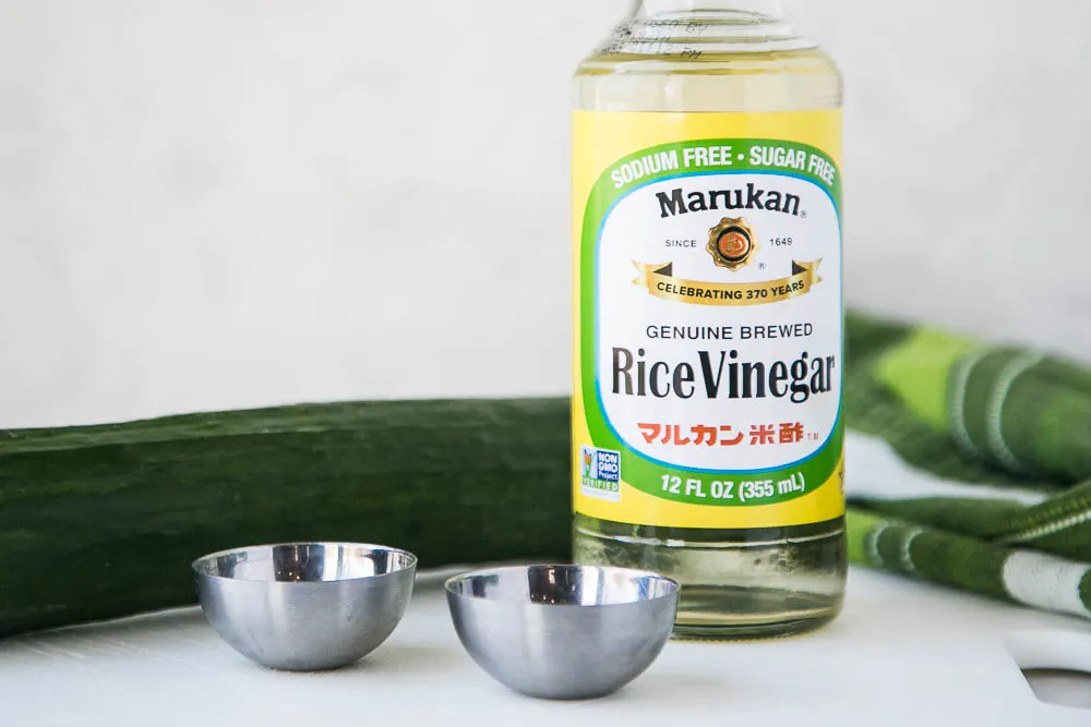 Simple Marinated Cucumbers aka Cucumbers & Vinegar is a crazy easy and fast side dish that goes with most everything! Plus they last a long time in the fridge for snacking. | perrysplate.com #cucumbersandvinegar #quickpickle