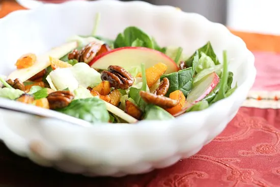 Make these 5-Minute Maple-Ginger Glazed Pecans and throw them on a salad or serve them as a quick little treat at a party! | pecan recipes | paleo recipes | salad toppings | - www.PerrysPlate.com