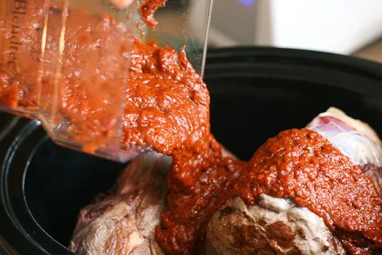 If you love that drippy, flavorful shredded beef in tacos from those hole-in-the-wall places, you HAVE to try this. It's easy to make a big batch of this shredded beef in your slow cooker! | perrysplate.com If you love that drippy, flavorful shredded beef in tacos from those hole-in-the-wall places, you HAVE to try this. It's easy to make a big batch of this shredded beef in your slow cooker! | perrysplate.com