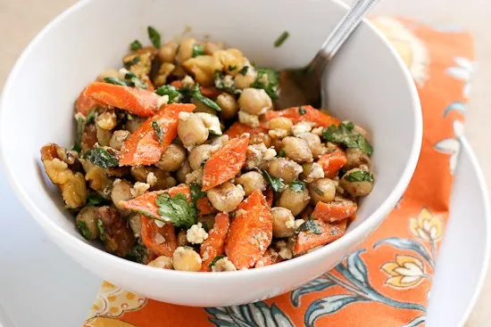 This is such a fun and unique take on a bean salad -- using cumin-roasted carrots and hearty mix-ins like feta and walnuts. | perrysplate.com This is such a fun and unique take on a bean salad -- using cumin-roasted carrots and hearty mix-ins like feta and walnuts. | perrysplate.com