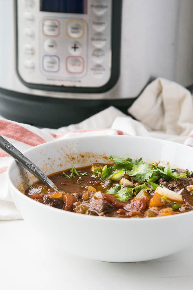 This is THE BEST steak chili ever. You can make it in a slow cooker or Instant Pot and it also freezes beautifully! It's also legume-free making it paleo-friendly. | perrysplate.com #steakchili #chilirecipe #instantpotrecipe