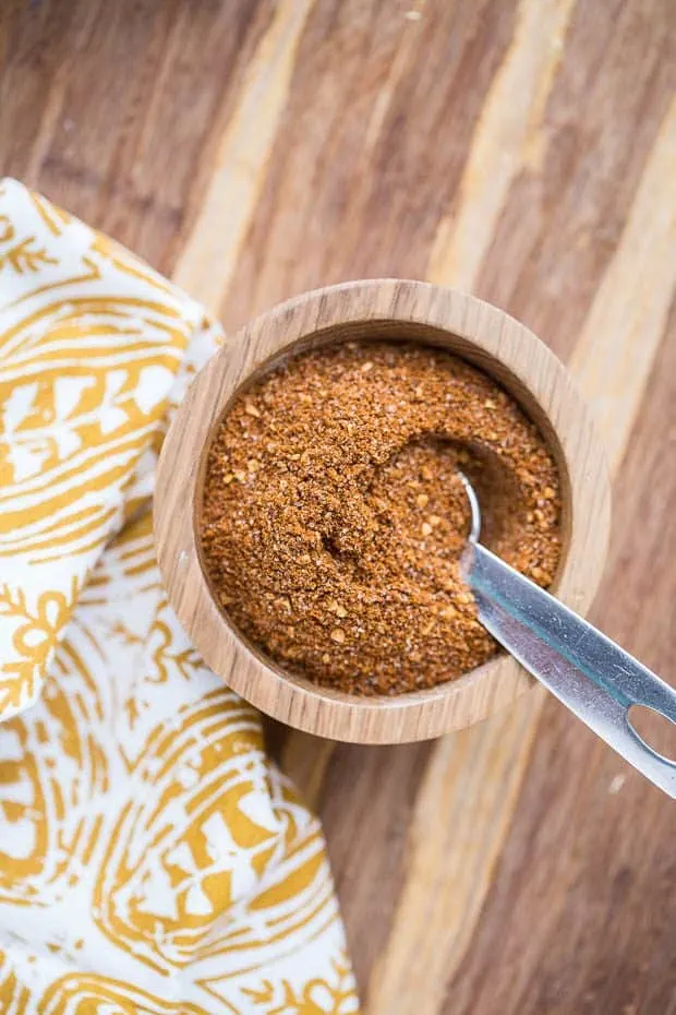 A small wooden bowl with Sweet Potato Fry Seasoning