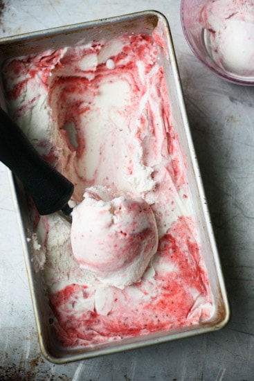 Have you ever roasted strawberries? It makes such a lovely swirl for this sweet and gingery ice cream that is naturally sweetened and can easily be made dairy free! | perrysplate.com