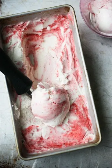 Ginger and Roasted Strawberry Ice Cream - www.perrysplate.com Have you ever roasted strawberries? It makes such a lovely swirl for this sweet and gingery ice cream that is naturally sweetened and can easily be made dairy free! | perrysplate.com