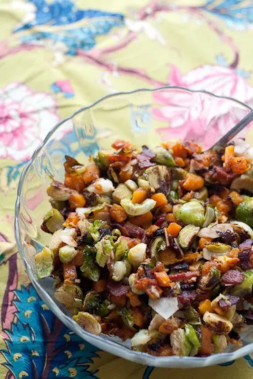 Roasted Brussels & Butternut Squash with Bacon. Everything is nicer with bacon. This Brussels sprout recipe is great as a Thanksgiving recipe, too!