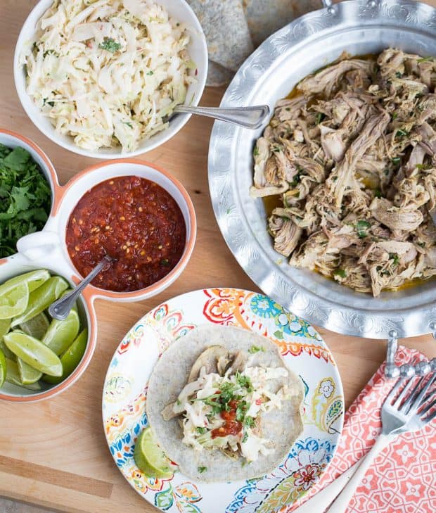 Thai Pulled Pork Tacos with Creamy Chili Slaw -- one of my favorite recipes that use Thai seasoning! From The Big Book of Paleo Slow Cooking by Natalie Perry