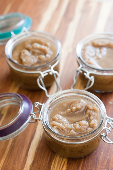 Sugar scrub in glass jars. Oil has separated from the brown sugar some.