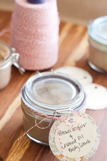 This homemade sugar scrub is a great DIY sugar scrub to use as a body exfoliator or a face scrub! You can also use salt or white sugar, too. A small jar of brown sugar scrub with a tag for gift giving.