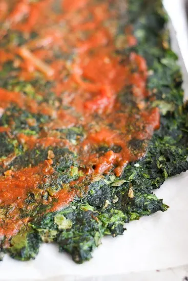 Greens Pizza Crust - A pizza crust made from spinach or kale! I know what you're thinking, but it's way better than you'd think it would be. | Low-carb pizza | Paleo pizza | PerrysPlate.com