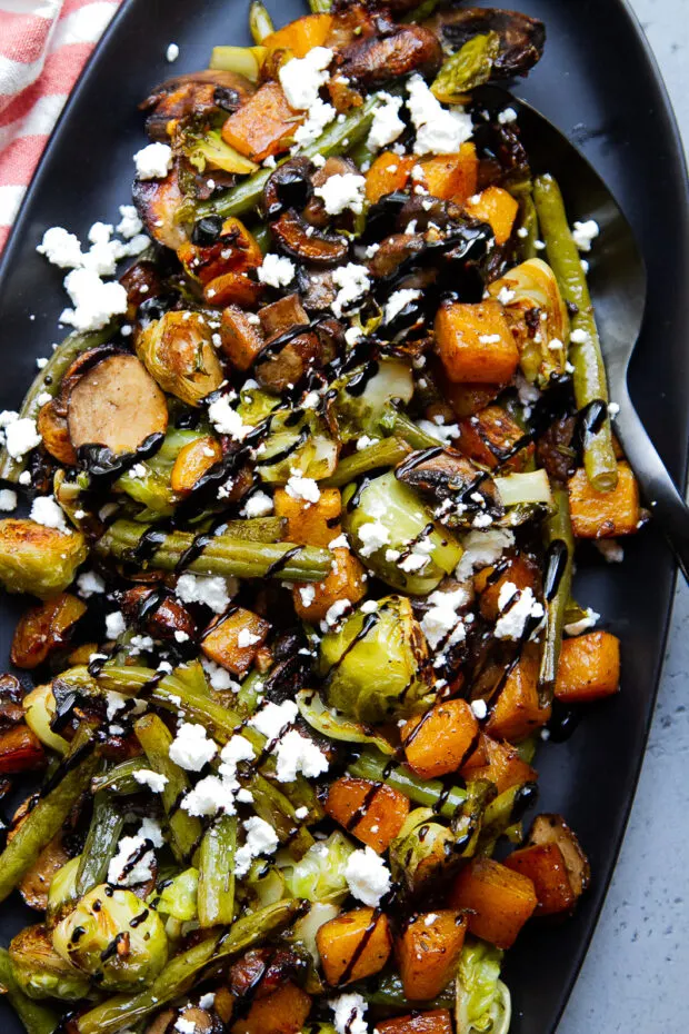 Another shot of the finished balsamic roasted vegetables on a platter.