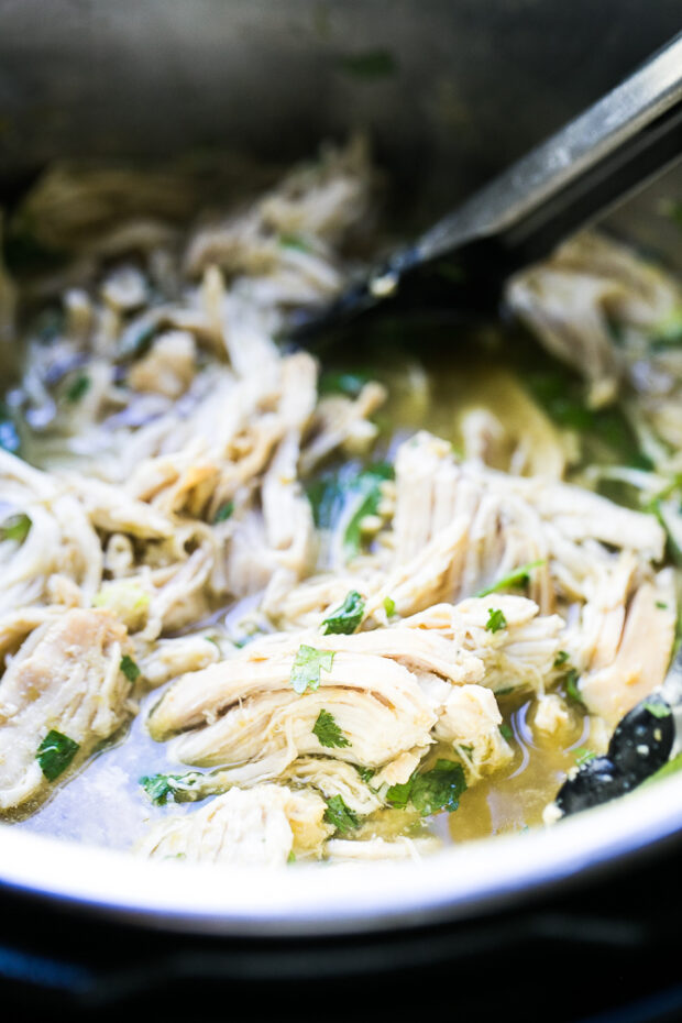 Green Chile Shredded Chicken for Instant Pot is great for tacos, salads, and all kinds of Tex-Mex meals.