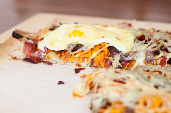 If you're a pizza-for-breakfast person you'll love this Grain-Free Breakfast Pizza topped with shredded roasted sweet potato hashbrowns, toasted salami, and drippy fried eggs. Oh, and cheese. It's not pizza without cheese. | PerrysPlate.com