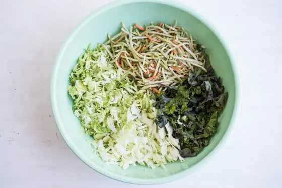 Sweet Kale Salad (Costco Copycat) -- Made with avocado oil-based dressing and a snap to put together! Makes a great potluck salad, too. | Paleo recipes | Potluck recipes | perrysplate.com