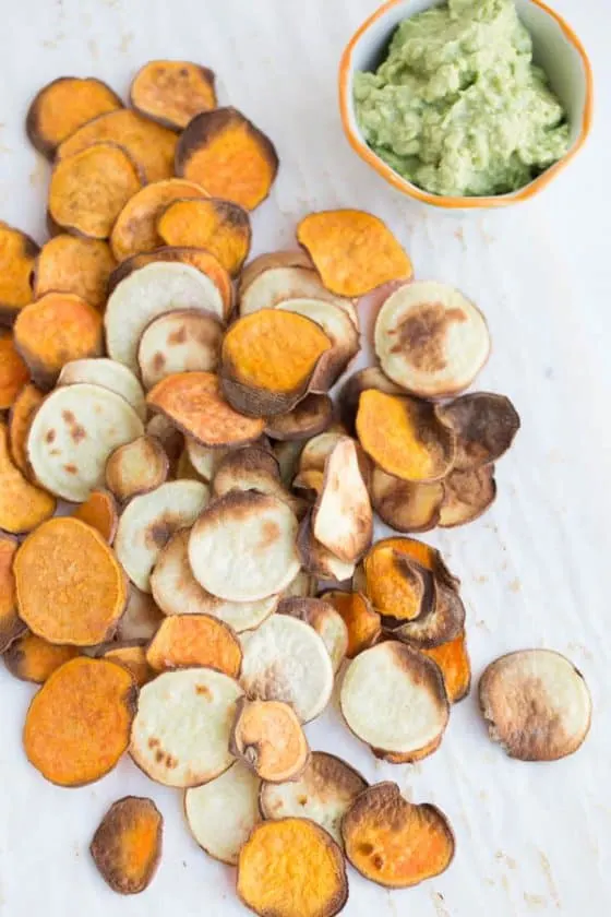 Secrets to crispy sweet potato chips! Roasting sweet potato chips is super easy and makes a great, homemade snack. | perrysplate.com Secrets to crispy sweet potato chips! Roasting sweet potato chips is super easy and makes a great, homemade snack. | perrysplate.com