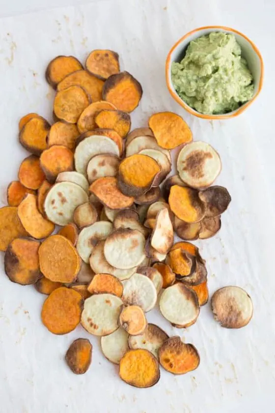 Secrets to crispy sweet potato chips! Roasting sweet potato chips is super easy and makes a great, homemade snack. | perrysplate.com Secrets to crispy sweet potato chips! Roasting sweet potato chips is super easy and makes a great, homemade snack. | perrysplate.com