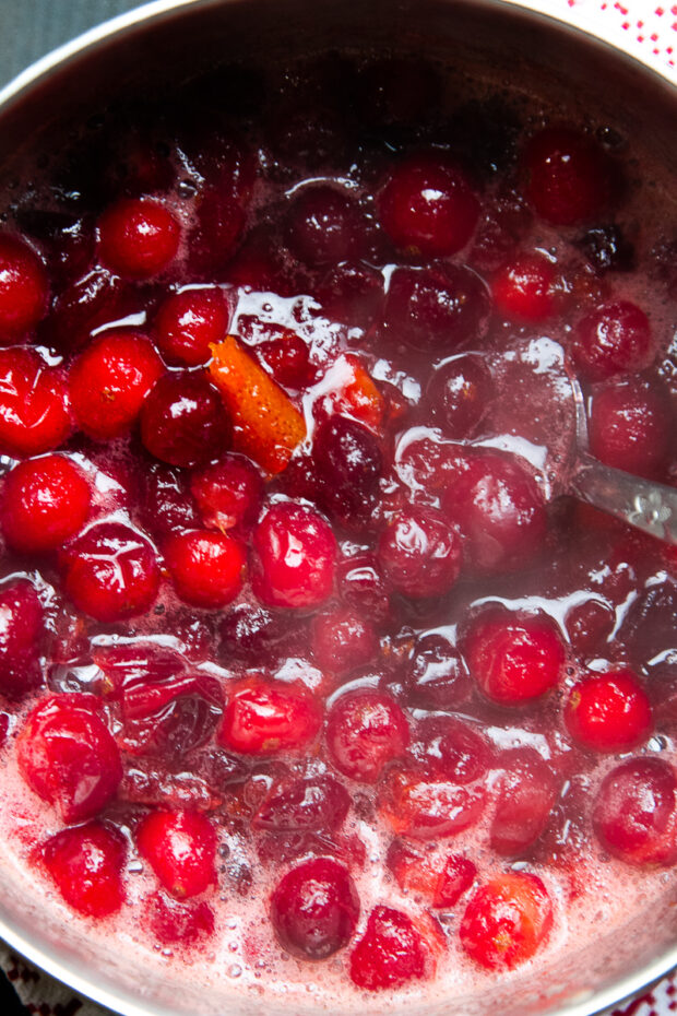 Simmering cranberry sauce -- berries are beginning to break down and get saucy.