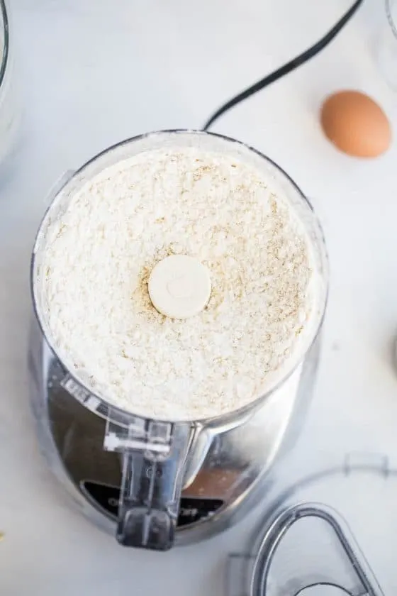 Perfect Gluten-Free Pie Crust -- Even better than most traditional pie crusts! | perrysplate.com | gluten-free recipes | gluten-free baking Cold butter cut into the gluten-free flour mixture in the work bowl of a food processor.