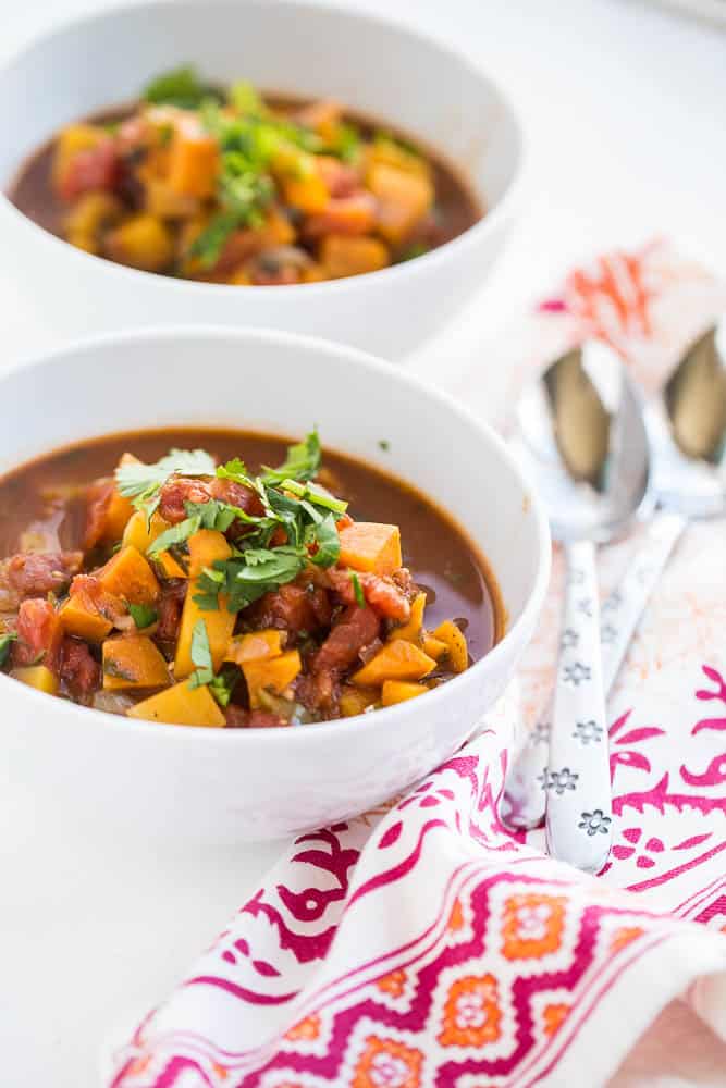 This Whole30 vegetarian chili has a unique spice blend and everyone who has ever tried it has raved about it! It's definitely a family favorite. (Especially when you throw a poached egg on there...) | perrysplate.com This Whole30 vegetarian chili has a unique spice blend and everyone who has ever tried it has raved about it! It's definitely a family favorite. (Especially when you throw a poached egg on there...) | perrysplate.com