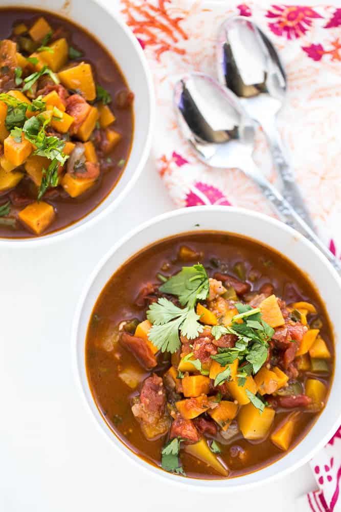 This Whole30 vegetarian chili has a unique spice blend and everyone who has ever tried it has raved about it! It's definitely a family favorite. (Especially when you throw a poached egg on there...) | perrysplate.com This Whole30 vegetarian chili has a unique spice blend and everyone who has ever tried it has raved about it! It's definitely a family favorite. (Especially when you throw a poached egg on there...) | perrysplate.com