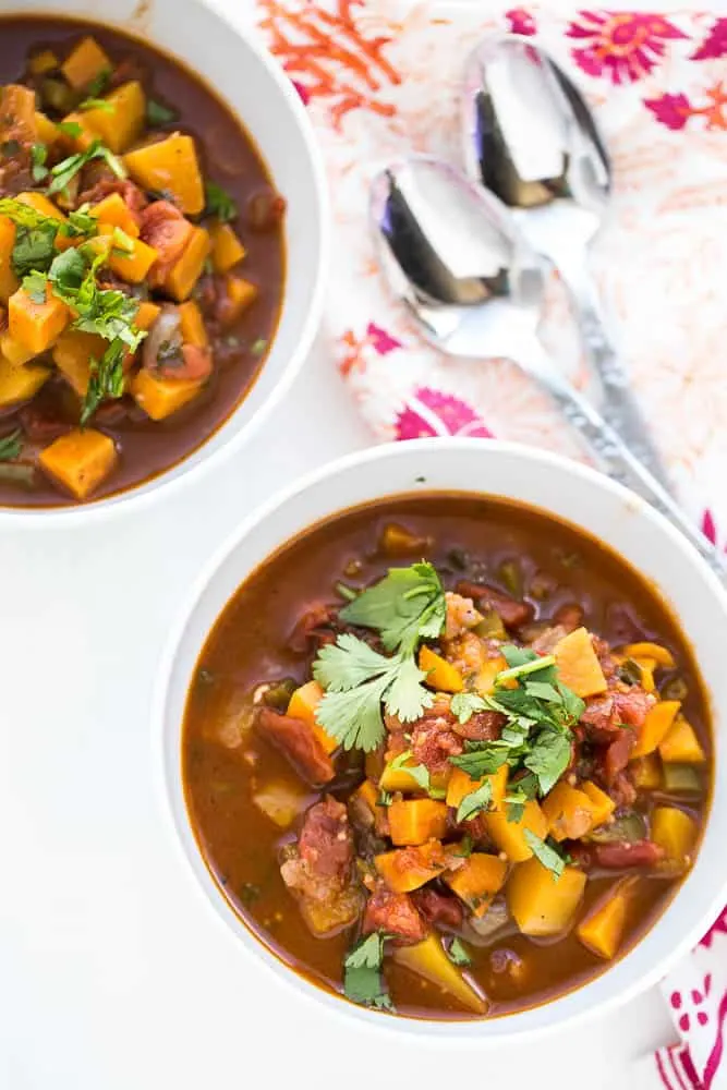 This Whole30 vegetarian chili has a unique spice blend and everyone who has ever tried it has raved about it! It's definitely a family favorite. (Especially when you throw a poached egg on there...) | perrysplate.com This Whole30 vegetarian chili has a unique spice blend and everyone who has ever tried it has raved about it! It's definitely a family favorite. (Especially when you throw a poached egg on there...) | perrysplate.com