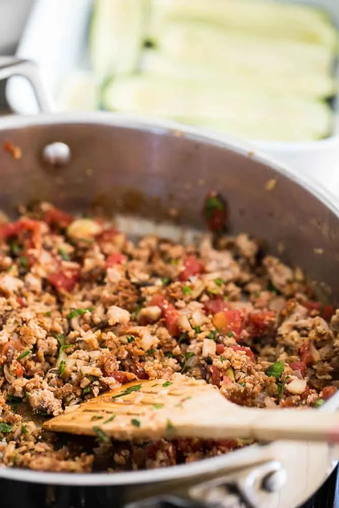 Here's a great use for all of that zucchini spilling out of your garden at the end of the summer! I love the addition of fresh herbs and the "cheesy" taste the nutritional yeast adds! You'll love this paleo and Whole30 friendly meal.