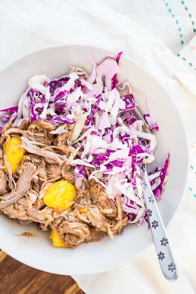 Slow Cooker Mango BBQ Pulled Pork with Jalapeno Slaw -- Perfect for potlucks or a weeknight summer meal! Paleo-friendly and dairy-free. | PerrysPlate.com