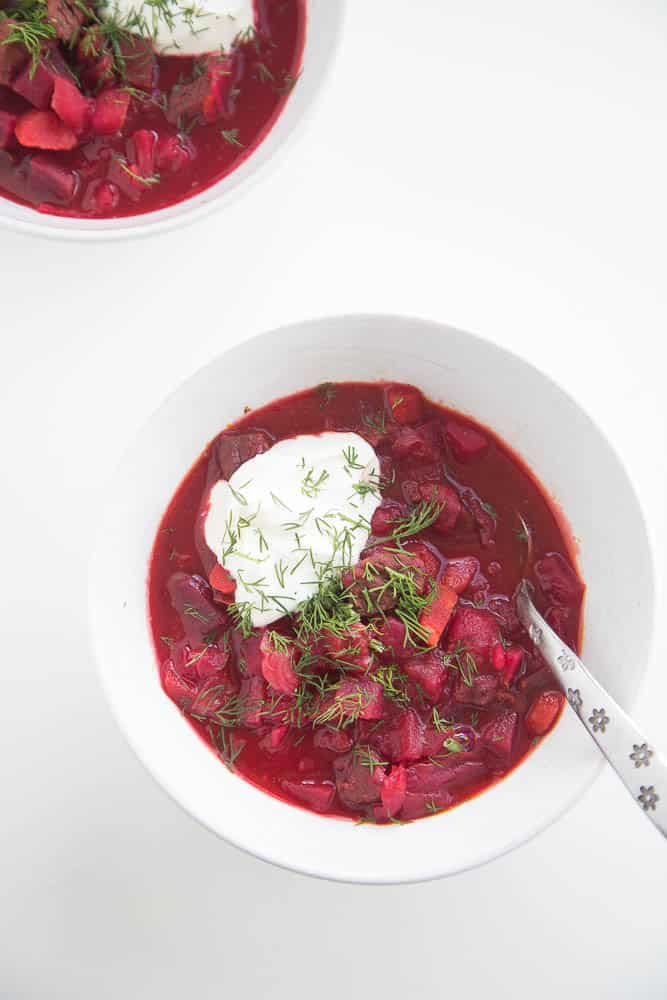 If you've never had borscht -- this is the recipe try first! Our kids go bonkers over this bright pink soup. | perrysplate.com #souprecipes #borscht #beefsoup