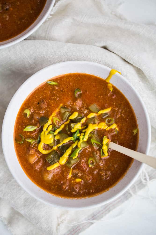 Paleo Instant Pot Cheeseburger Soup | This soup has all of the best flavors from a classic cheeseburger and freezes well! It's also paleo and easily made Whole30 compliant. | Instant Pot recipes | ground beef recipes | soup recipes | perrysplate.com