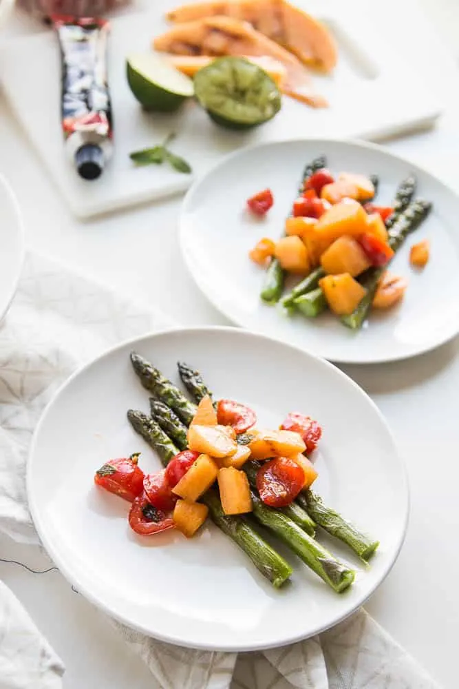Have you ever grilled melon? It intensifies and caramelizes the natural sugars and adds a little smokiness. It's divine. This gluten-free and dairy-free Asparagus and Grilled Melon Salad is from Giada's Italy by Giada De Laurentiis. Grab the recipe and read a review of her book! | perrysplate.com 