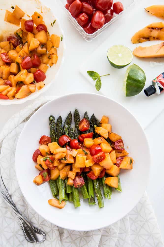Have you ever grilled melon? It intensifies and caramelizes the natural sugars and adds a little smokiness. It's divine. This gluten-free and dairy-free Asparagus and Grilled Melon Salad is from Giada's Italy by Giada De Laurentiis. Grab the recipe and read a review of her book! | perrysplate.com