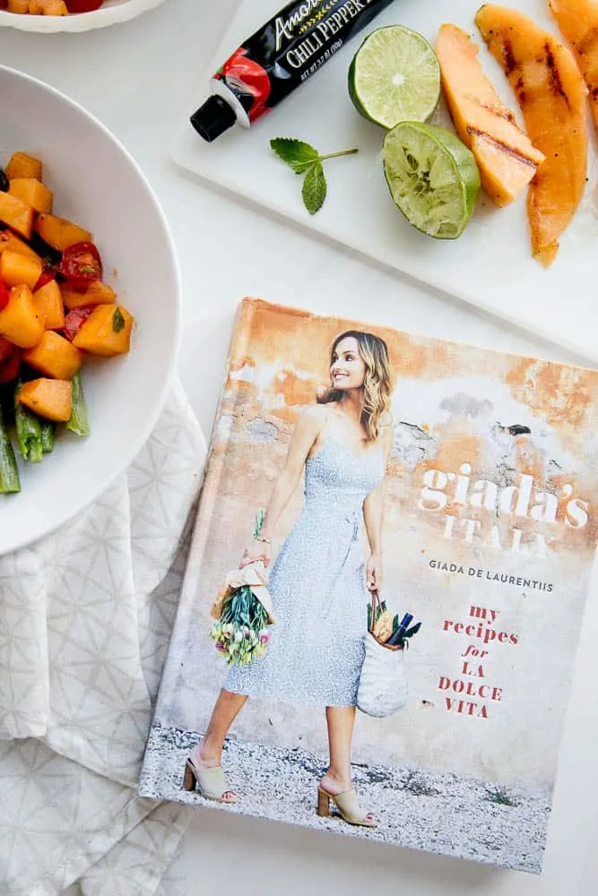 Have you ever grilled melon? It intensifies and caramelizes the natural sugars and adds a little smokiness. It's divine. This gluten-free and dairy-free Asparagus and Grilled Melon Salad is from Giada's Italy by Giada De Laurentiis. Grab the recipe and read a review of her book! | perrysplate.com