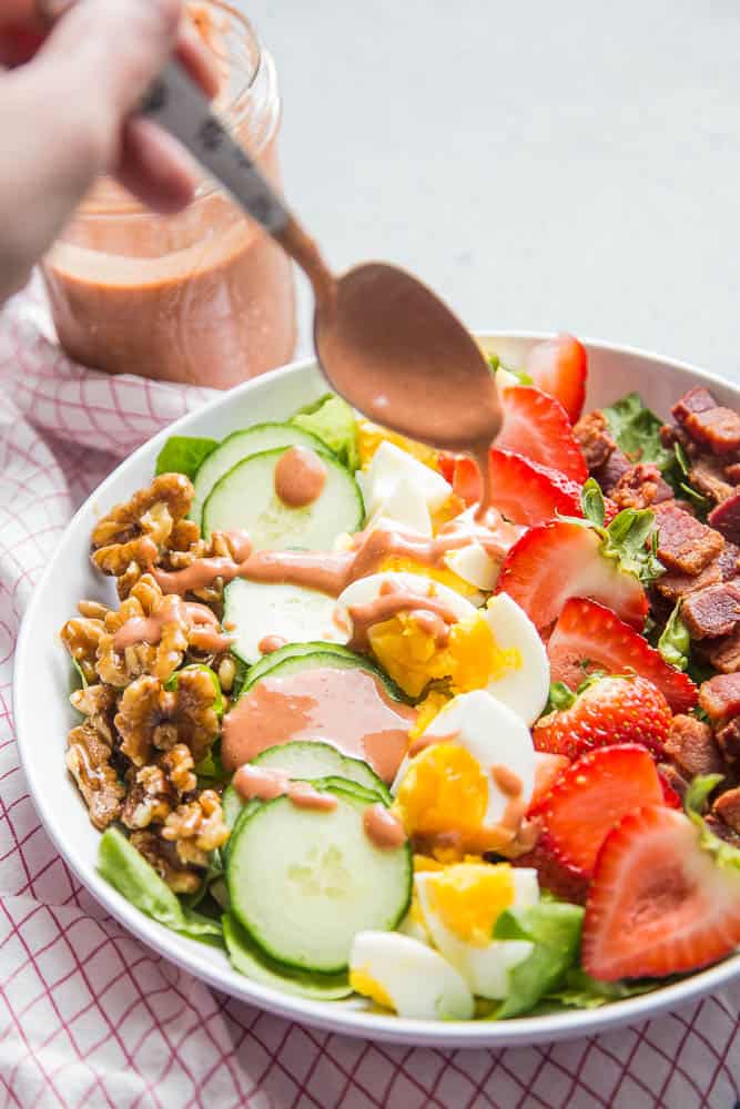 This is a fun twist on a cobb salad with sweet strawberries, toasted walnuts and strawberry-balsamic dressing! It's paleo and Whole30 friendly, too. | perrysplate.com