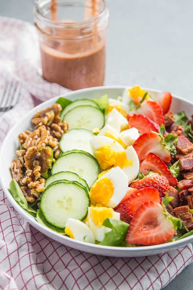 This is a fun twist on a cobb salad with sweet strawberries, toasted walnuts and strawberry-balsamic dressing! It's paleo and Whole30 friendly, too. | perrysplate.com