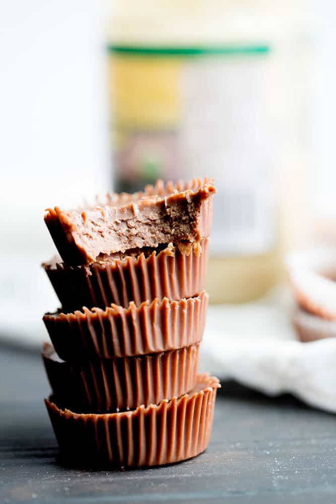 These little keto chocolate tahini fat bombs taste like a peanut butter cup without the nuts! They come together quickly and easily and will help keep your face out of the Reese's bag. | low-carb recipes | low carb high fat | perrysplate.com These little keto chocolate tahini fat bombs taste like a peanut butter cup without the nuts! They come together quickly and easily and will help keep your face out of the Reese's bag. | low-carb recipes | low carb high fat | perrysplate.com