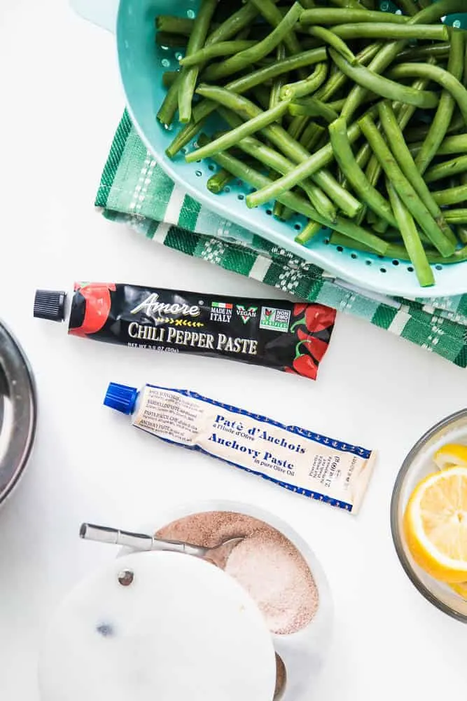 The recipe that made me love green beans. Magic Sautéed Green Beans are a quick and easy side dish (with only a handful of ingredients) to throw together on a weeknight or with a large Thanksgiving meal. | perrysplate.com
