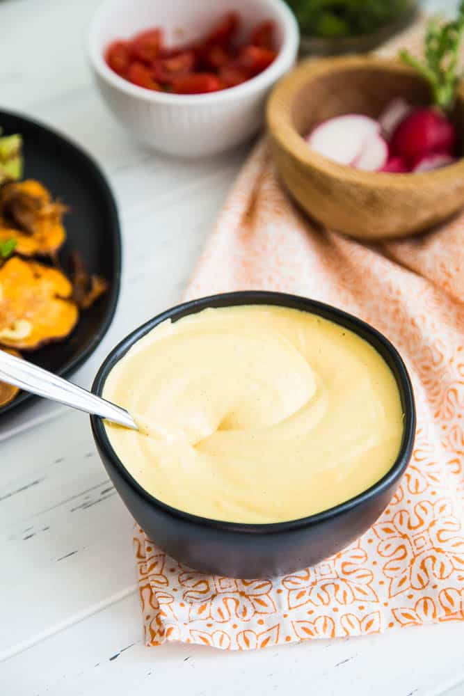 Chipotle Vegan Queso + Amazing Paleo Nachos | This dairy-free cashew cheese sauce is a snap and makes some seriously delicious paleo nachos! | perrysplate.com