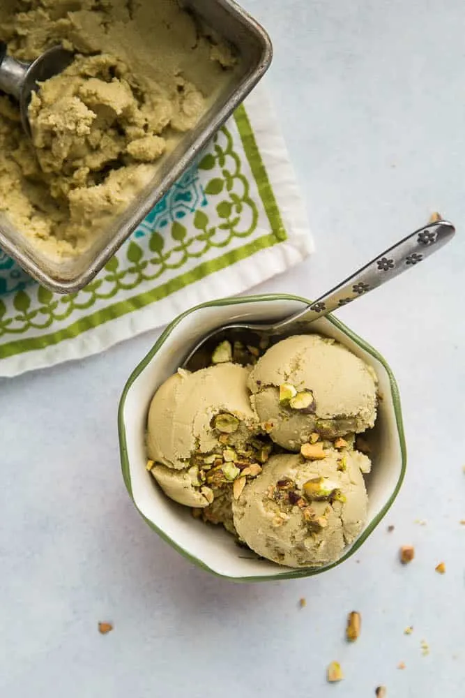 Dairy Free Pistachio Ice Cream starts off with homemade pistachio milk -- it's easier than you think! This ice cream is naturally sweetened and has a low-carb/keto option, too. | perrysplate.com