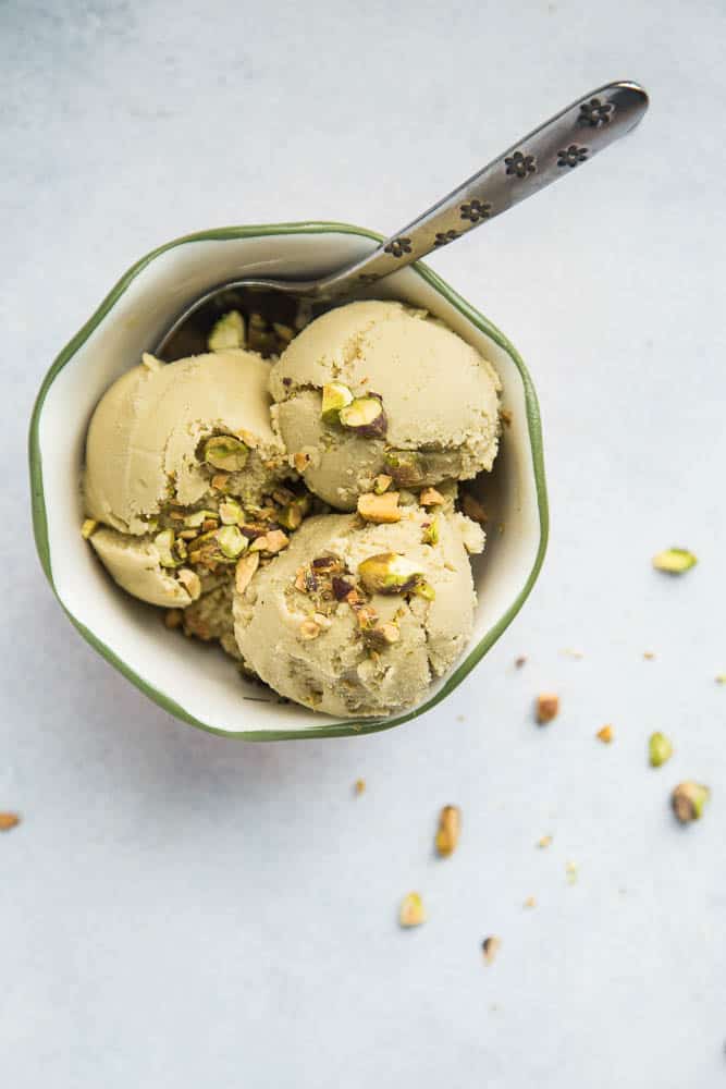 Dairy Free Pistachio Ice Cream starts off with homemade pistachio milk -- it's easier than you think! This ice cream is naturally sweetened and has a low-carb/keto option, too. | perrysplate.com