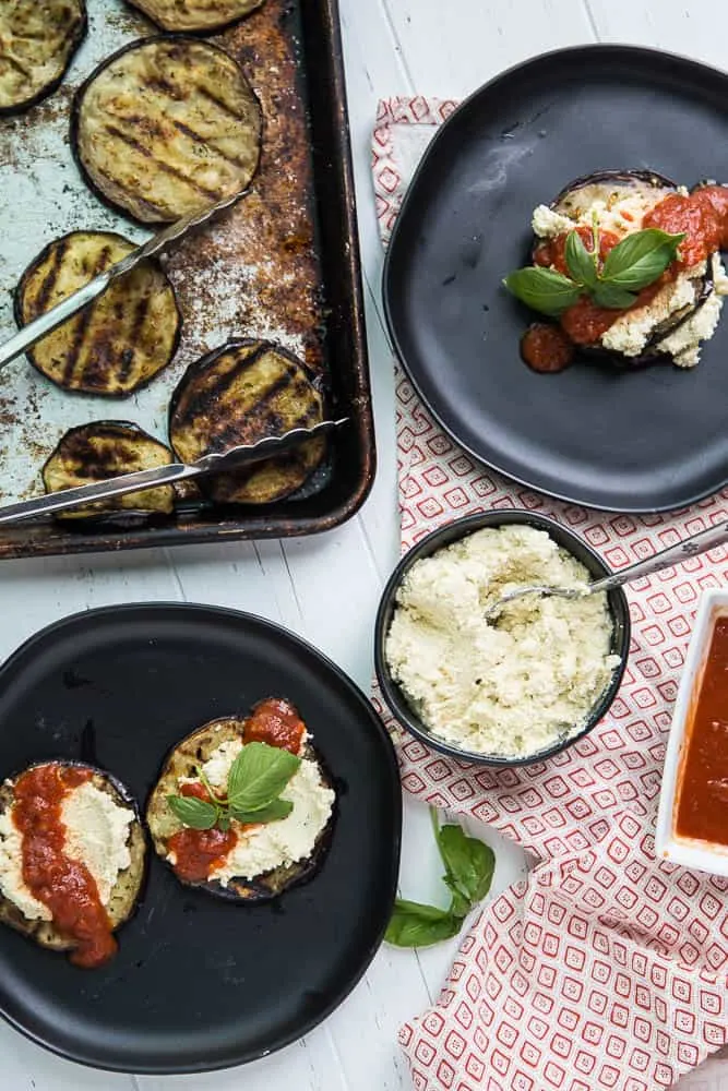 Have you ever tried macadamia ricotta "cheese"? It's hearty, dairy-free alternative to ricotta filled with lots of healthy fats. These Grilled Eggplant Stacks remind me of lasagna, but much less fussy. It's also low-carb and Keto friendly! | perrysplate.com