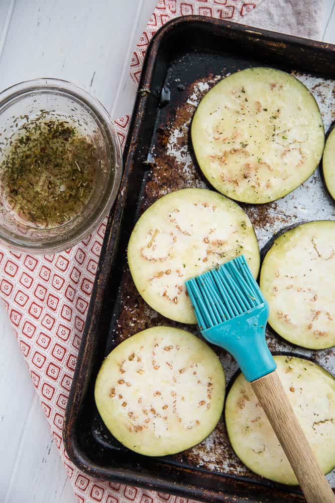 Have you ever tried macadamia ricotta "cheese"? It's hearty, dairy-free alternative to ricotta filled with lots of healthy fats. These Grilled Eggplant Stacks remind me of lasagna, but much less fussy. It's also low-carb and Keto friendly! | perrysplate.com