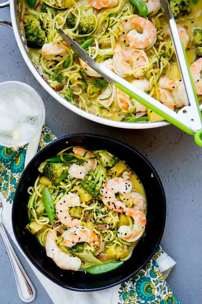 Whip up this easy Thai Green Curry Zoodle dish on a busy weeknight. It's packed with shrimp, green vegetables, and sweet bites of pineapple. Paleo & Whole30 friendly! | perrysplate.com